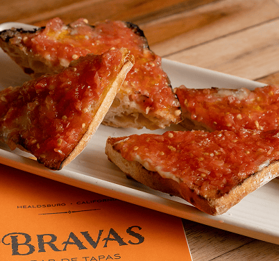 Four slices of pan con tomate 